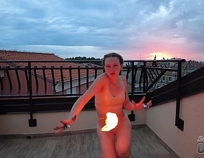 060723_hot_ginger_fire_dancing_nude_at_sunset_while_on_vacation